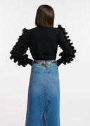 Pull en tricot noir à volants Essentiel