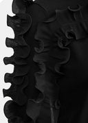 Pull en tricot noir à volants Essentiel