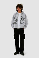 Sweat à capuche zippé avec logo fleuri
