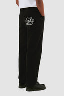 Pantalon à poches brodées Arte