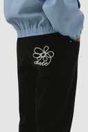 Pantalon à poches brodées Arte