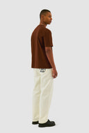 Pantalon à poches brodées Arte