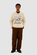 Logo fleur en tricot