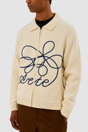 Logo fleur en tricot