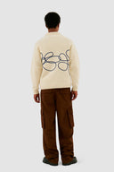 Logo fleur en tricot
