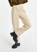 pantalon Essentiel fuselé en velours blanc cassé