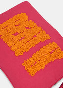 pochette Essentiel dinosaure' à paillettes multicolores